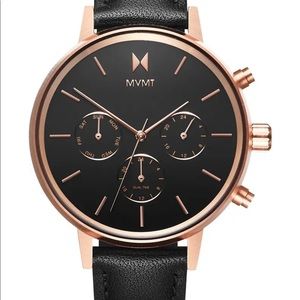 MVMT black and gold watch on leather strap